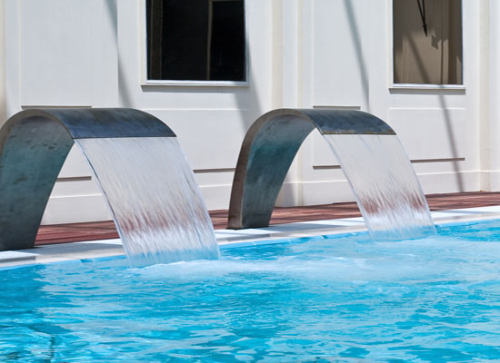 Water fountain feature bubbling in a pool